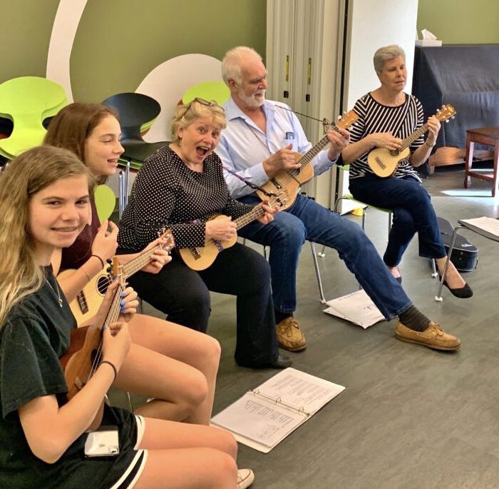 Students having fun in ukulele class