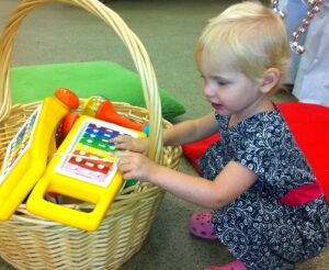 toddler with xylophone